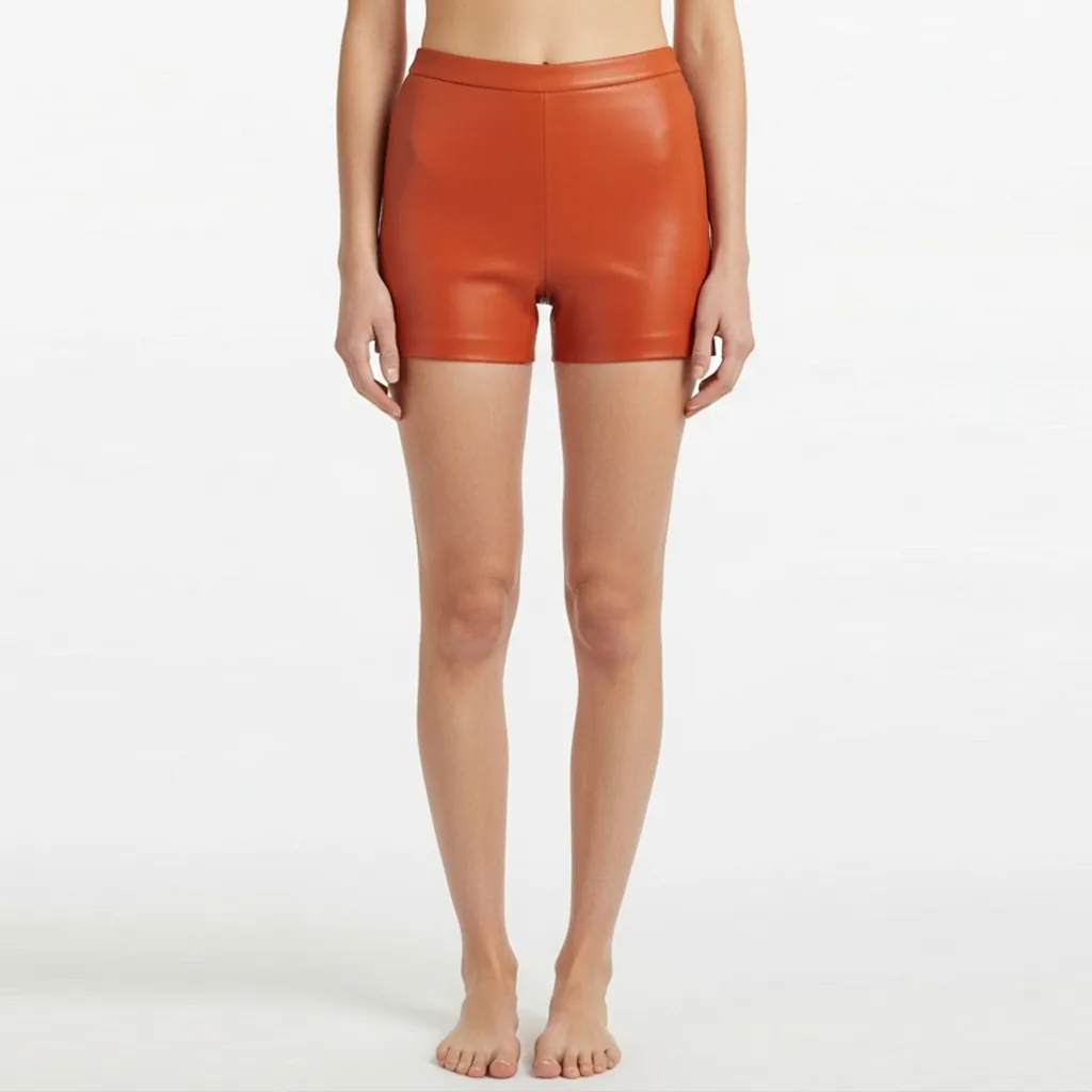 high waist orange shorts muted flame front view